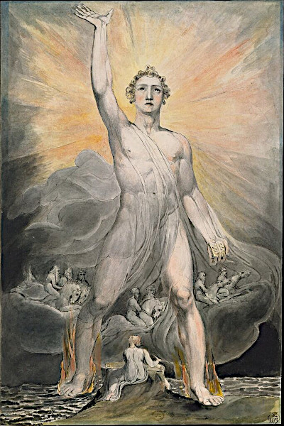 A dramatic 19th-century watercolor illustration by William Blake titled Angel of the Revelation. A colossal, muscular, and ethereal angel spans across the frame with one foot planted on the sea and the other on land, surrounded by stylized flames at his feet. The angel raises his right arm straight up toward a radiant halo of golden light, while his left hand holds a small open book. Swirling dark grey clouds form around his legs, containing small, faintly drawn figures of horsemen and people caught in apocalyptic chaos. At the bottom center, a small figure of Saint John sits with a scroll, looking up in awe.