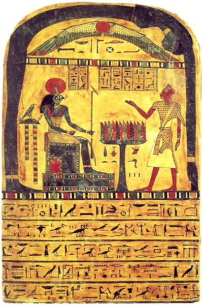 A painted, arched wooden Egyptian funerary tablet from the 26th Dynasty. The top curve features a detailed blue sky goddess, Nut, stretching over the scene. Below her, the falcon-headed sun god Ra-Hoor-Khuit sits enthroned on the right, holding a scepter. On the left, the priest Ankh-ef-en-Khonsu stands draped in a leopard skin, raising his hands in adoration over an offering table piled with bread and lotuses. Hieroglyphic columns fill the spaces.