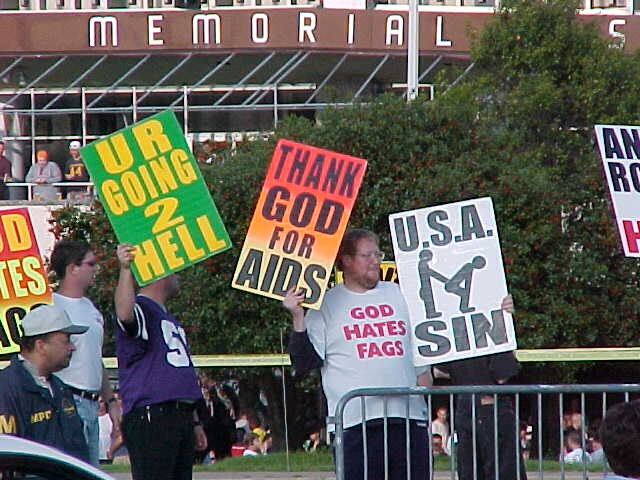 n	Westboro Baptist Church members from Topeka, Kansas protesting in front of RFK Stadium located in Washington, D.C.