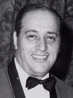 Historic black and white publicity photograph of the real Frank "Tony Lip" Vallelonga wearing a tuxedo and bow tie.