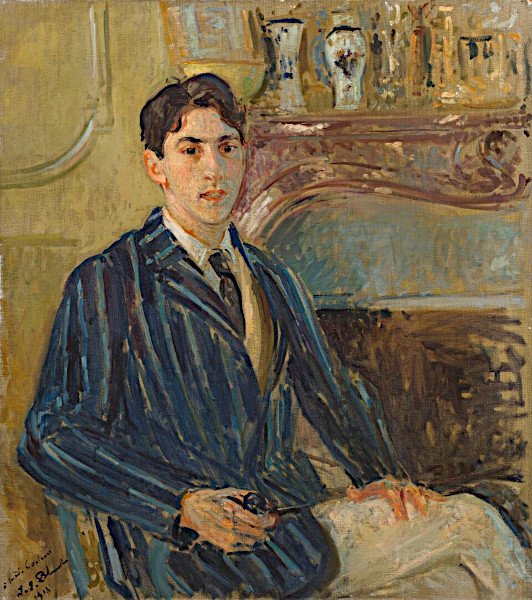 An Impressionist oil painting depicting a youthful Jean Cocteau seated indoors. He has short dark hair and is looking directly at the viewer while wearing a dark, vertically striped navy blue suit jacket, a white collared shirt, and a dark tie. He holds a pipe in his right hand. In the background, a highly detailed, carved marble fireplace mantle features decorative porcelain vases and items resting on top.
